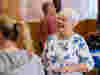An older woman enjoying herself at an RVS social club