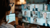 Somebody taking part in a webinar and looking at their screen seeing multiple participants of the webinar