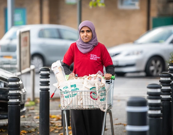 Royal Voluntary Service volunteer collecting shopping from a supermarket