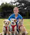 Ellie Simmonds with three dogs as part of the Role of a Lifetime campaign to inspire volunteering