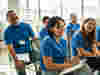 A group of work collegues attending a relaxed meeting 