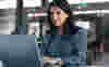 A corporate employee completing a volunteering assesment online at her laptop