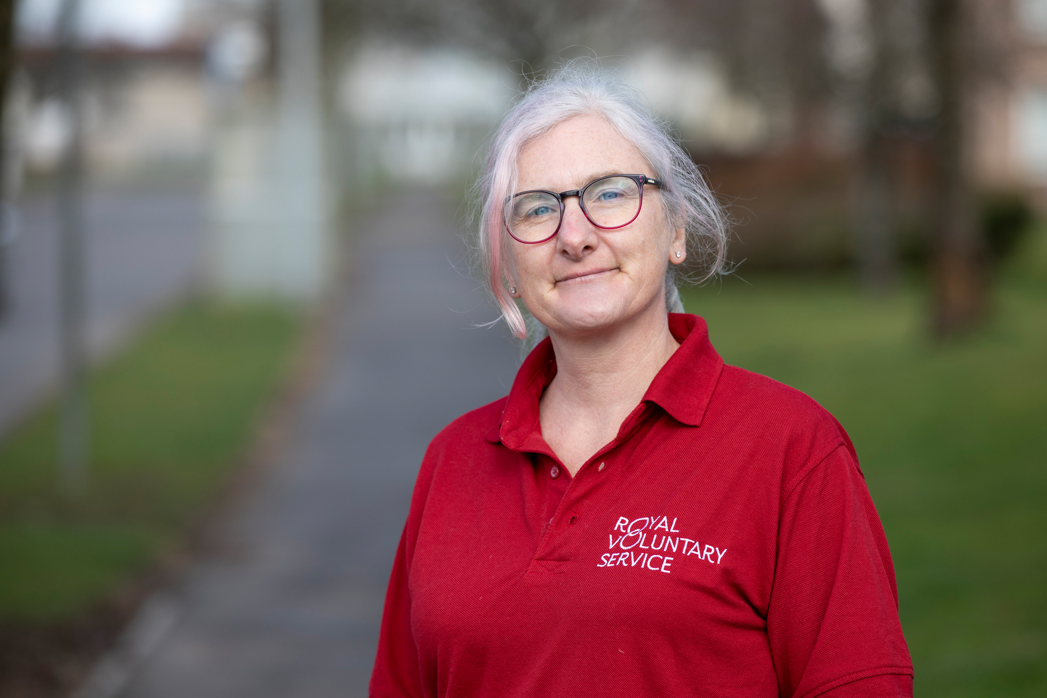 Royal Voluntary Service volunteer smiling