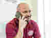An emergency response volunteer on the phone 
