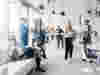 A modern image of people in the office showing movement 