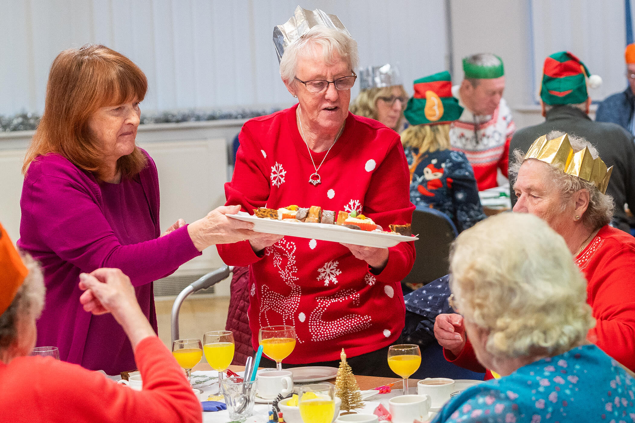 Celebrating a Christmas meal with friends