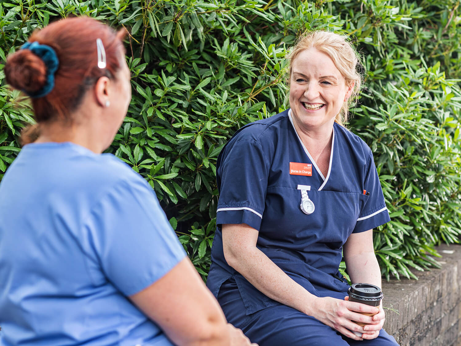 Two medical workers talking 